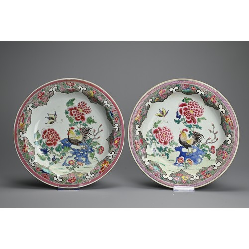 50 - A LARGE PAIR OF CHINESE FAMILLE ROSE PORCELAIN ROOSTER DISHES, EARLY 18TH CENTURY. With rounded side... 