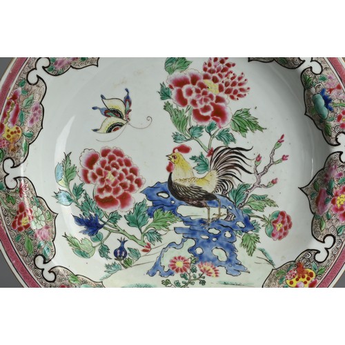 50 - A LARGE PAIR OF CHINESE FAMILLE ROSE PORCELAIN ROOSTER DISHES, EARLY 18TH CENTURY. With rounded side... 