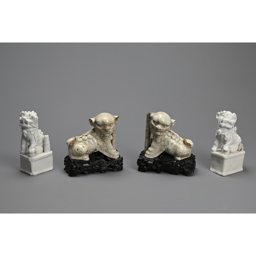 8 - TWO PAIRS OF CHINESE PORCELAIN JOSS STICK HOLDERS, QING DYNASTY. In the form of lion dogs, seated wi... 