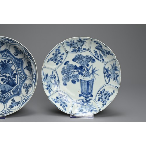 55 - A PAIR OF CHINESE BLUE AND WHITE KRAAK WARE PORCELAIN DISHES, LATE MING DYNASTY. The first decorated... 