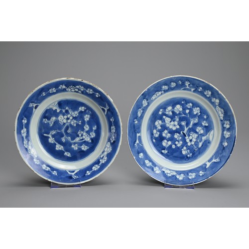 58 - TWO PAIRS OF CHINESE BLUE AND WHITE PORCELAIN DISHES, EARLY 18TH CENTURY. Decorated with peony bloom... 