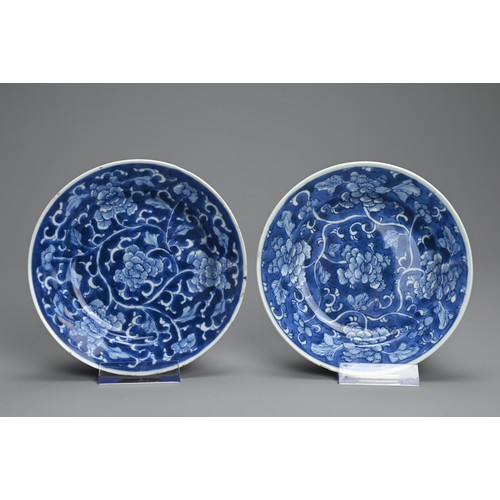 58 - TWO PAIRS OF CHINESE BLUE AND WHITE PORCELAIN DISHES, EARLY 18TH CENTURY. Decorated with peony bloom... 