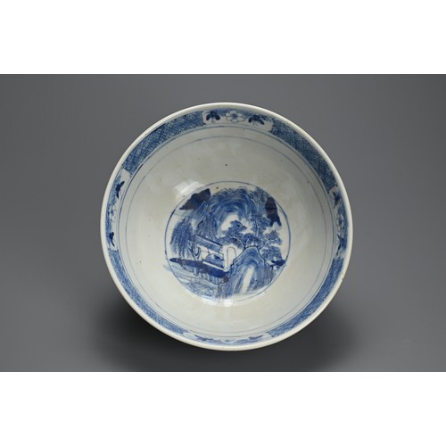 60 - A LARGE CHINESE BLUE AND WHITE PORCELAIN BOWL, 19TH CENTURY. Decorated with figures on a bridge in a... 