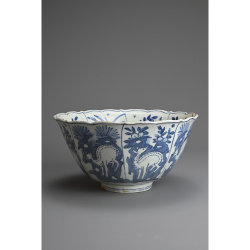 62 - A LARGE CHINESE BLUE AND WHITE PORCELAIN DEER BOWL, LATE MING DYNASTY. The bowl with deep rounded si... 