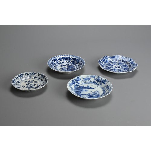 63 - A GROUP OF FOUR CHINESE BLUE AND WHITE PORCELAIN DISHES, EARLY 18TH CENTURY. Of various lobed forms ... 