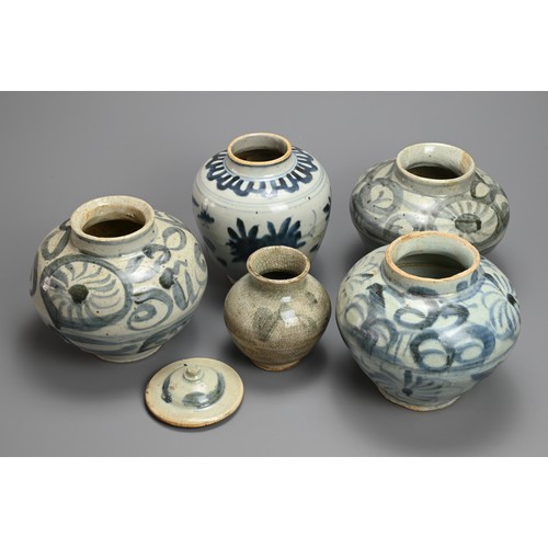 69 - A GROUP OF FIVE CHINESE BLUE AND WHITE PORCELAIN JARS, LATE MING DYNASTY. Three matching jars, one w... 