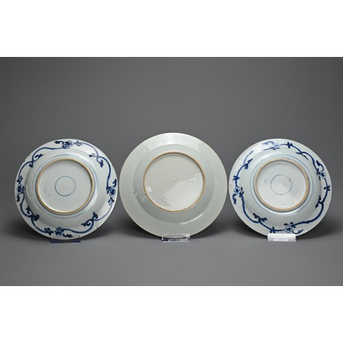 76 - THREE CHINESE BLUE AND WHITE KRAAK STYLE PORCELAIN DISHES, 17/18TH CENTURY. To include a pair decora... 