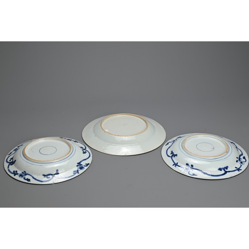 76 - THREE CHINESE BLUE AND WHITE KRAAK STYLE PORCELAIN DISHES, 17/18TH CENTURY. To include a pair decora... 