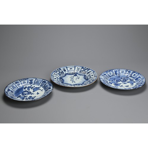 76 - THREE CHINESE BLUE AND WHITE KRAAK STYLE PORCELAIN DISHES, 17/18TH CENTURY. To include a pair decora... 