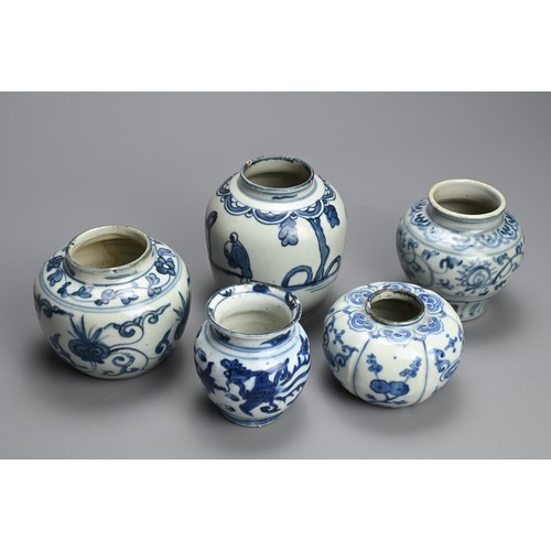 84 - A GROUP OF CHINESE BLUE AND WHITE PORCELAIN JARS, MING DYNASTY. Five jars of various forms decorated... 