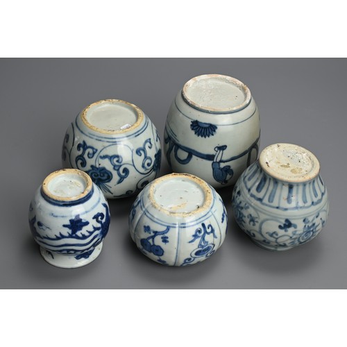 84 - A GROUP OF CHINESE BLUE AND WHITE PORCELAIN JARS, MING DYNASTY. Five jars of various forms decorated... 