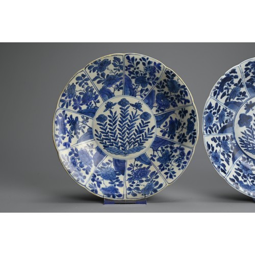 94 - TWO CHINESE BLUE AND WHITE PORCELAIN DISHES, 18TH CENTURY. Both dishes lobed and decorated with pane... 