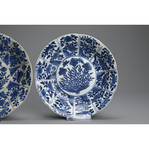 94 - TWO CHINESE BLUE AND WHITE PORCELAIN DISHES, 18TH CENTURY. Both dishes lobed and decorated with pane... 