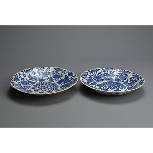 94 - TWO CHINESE BLUE AND WHITE PORCELAIN DISHES, 18TH CENTURY. Both dishes lobed and decorated with pane... 