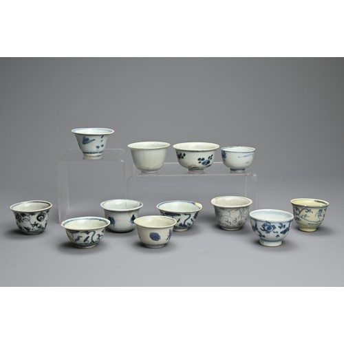 98 - A GROUP OF CHINESE BLUE AND WHITE PORCELAIN WINE CUPS, MING DYNASTY. Twelve cups of various sizes de... 