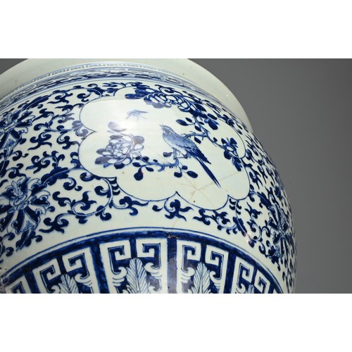 107 - A LARGE CHINESE BLUE AND WHITE PORCELAIN JARDINIERE, 19TH CENTURY. Decorated with panels of birds an... 