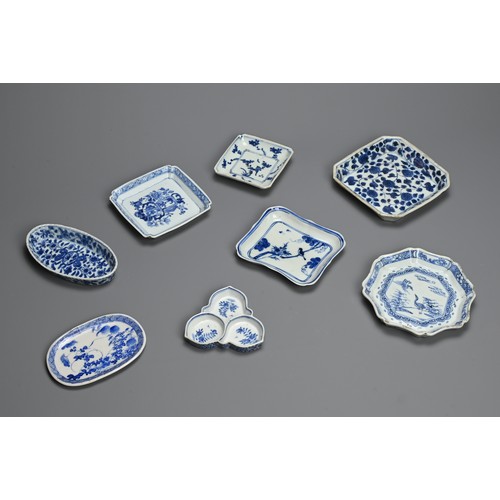 119 - A GROUP OF CHINESE BLUE AND WHITE PORCELAIN DISHES AND TRAYS, QING DYNASTY. Eight of various forms t... 