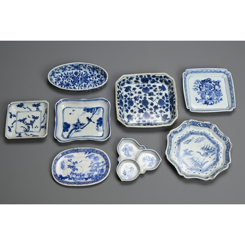 119 - A GROUP OF CHINESE BLUE AND WHITE PORCELAIN DISHES AND TRAYS, QING DYNASTY. Eight of various forms t... 