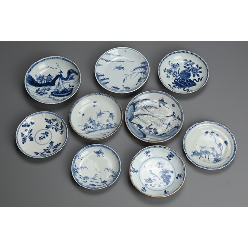 122 - A GROUP OF NINE CHINESE BLUE AND WHITE PORCELAIN DISHES, 18TH CENTURY. Decorated with birds, deer, f... 