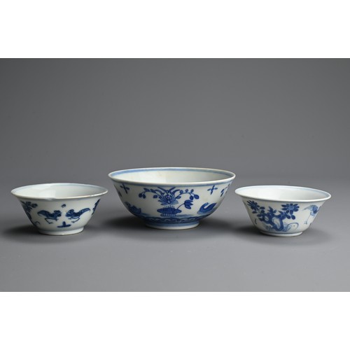 127 - THREE CHINESE BLUE AND WHITE PORCELAIN BOWL AND CUPS, 18/19TH CENTURY. The bowl decorated with ducks... 