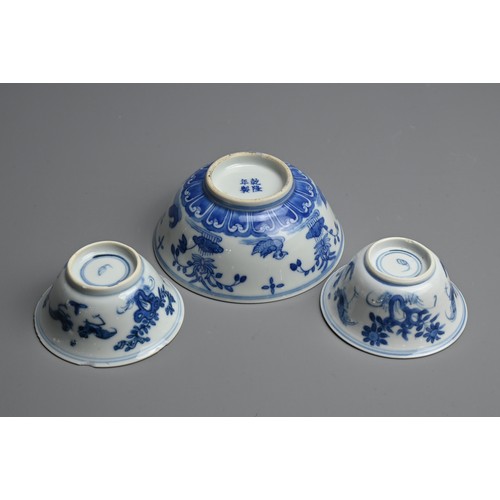 127 - THREE CHINESE BLUE AND WHITE PORCELAIN BOWL AND CUPS, 18/19TH CENTURY. The bowl decorated with ducks... 