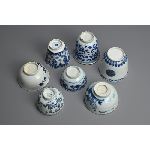 128 - A GROUP OF CHINESE BLUE AND WHITE PORCELAIN CUPS, 18TH CENTURY. Seven cups of various forms decorate... 