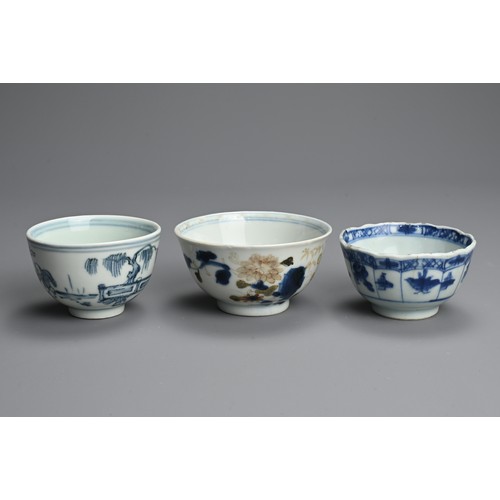 128 - A GROUP OF CHINESE BLUE AND WHITE PORCELAIN CUPS, 18TH CENTURY. Seven cups of various forms decorate... 