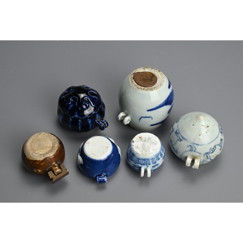 134 - A GROUP OF CHINESE PORCELAIN BIRD FEEDERS, MING / QING DYNASTY. Six to include a blue and white lotu... 