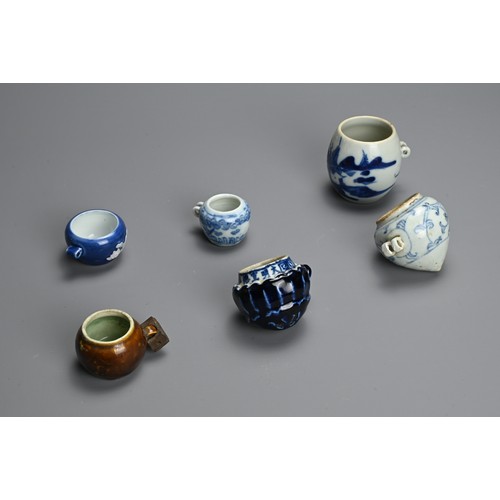 134 - A GROUP OF CHINESE PORCELAIN BIRD FEEDERS, MING / QING DYNASTY. Six to include a blue and white lotu... 