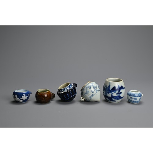 134 - A GROUP OF CHINESE PORCELAIN BIRD FEEDERS, MING / QING DYNASTY. Six to include a blue and white lotu... 