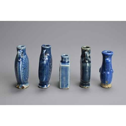 137 - A GROUP OF CHINESE BLUE GLAZED PORCELAIN BOTTLES, QING DYNASTY. Five medicine or snuff bottles of va... 