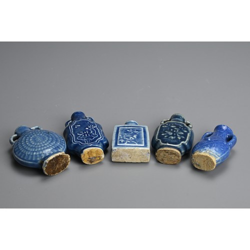 137 - A GROUP OF CHINESE BLUE GLAZED PORCELAIN BOTTLES, QING DYNASTY. Five medicine or snuff bottles of va... 