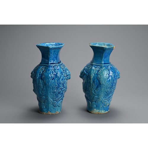 149 - A PAIR OF CHINESE TURQUOISE GLAZED STONEWARE VASES, LATE MING DYNASTY. Each moulded with dragons in ... 