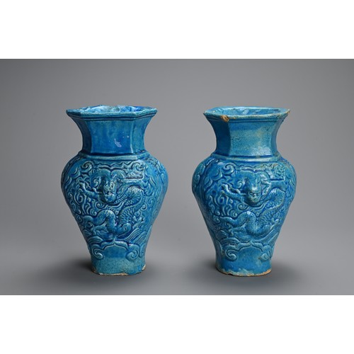 149 - A PAIR OF CHINESE TURQUOISE GLAZED STONEWARE VASES, LATE MING DYNASTY. Each moulded with dragons in ... 