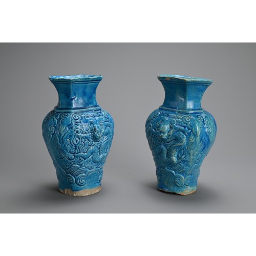 149 - A PAIR OF CHINESE TURQUOISE GLAZED STONEWARE VASES, LATE MING DYNASTY. Each moulded with dragons in ... 