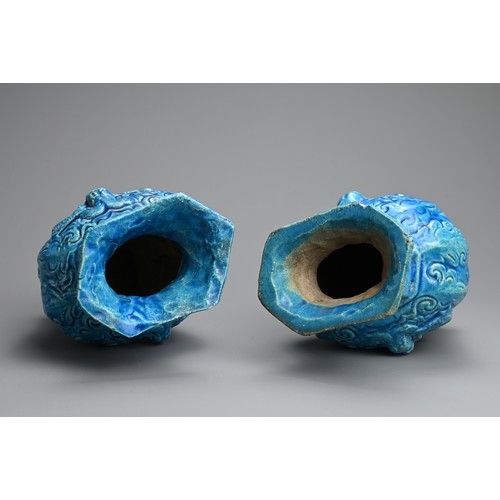 149 - A PAIR OF CHINESE TURQUOISE GLAZED STONEWARE VASES, LATE MING DYNASTY. Each moulded with dragons in ... 