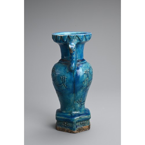 150 - A RARE CHINESE TURQUOISE GLAZED STONEWARE VASE, LATE MING DYNASTY. Moulded with mask handles and dra... 