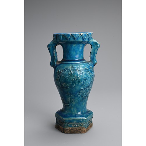 150 - A RARE CHINESE TURQUOISE GLAZED STONEWARE VASE, LATE MING DYNASTY. Moulded with mask handles and dra... 