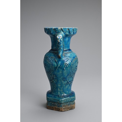 150 - A RARE CHINESE TURQUOISE GLAZED STONEWARE VASE, LATE MING DYNASTY. Moulded with mask handles and dra... 