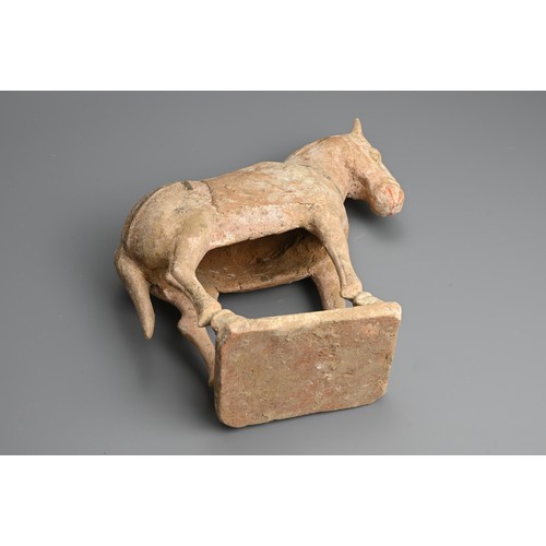 160 - A CHINESE PAINTED POTTERY MODEL OF A HORSE, TANG DYNASTY. Modelled standing four square, decorated w... 