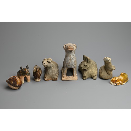 162 - A GROUP OF CHINESE POTTERY MODELS OF ANIMALS, TANG TO MING DYNASTY. To include four unglazed models ... 