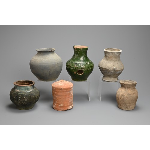 164 - A GROUP OF EARLY CHINESE POTTERY JARS, NEOLITHIC TO PROBABLY YUAN DYNASTY. Six vessels of various fo... 