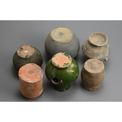 164 - A GROUP OF EARLY CHINESE POTTERY JARS, NEOLITHIC TO PROBABLY YUAN DYNASTY. Six vessels of various fo... 