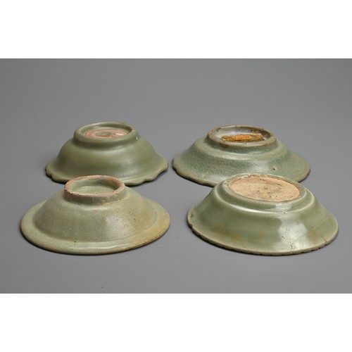 168 - A GROUP OF CHINESE LONGQUAN CELADON GLAZED PORCELAIN DISHES, YUAN /MING DYNASTY. Four dishes of vari... 