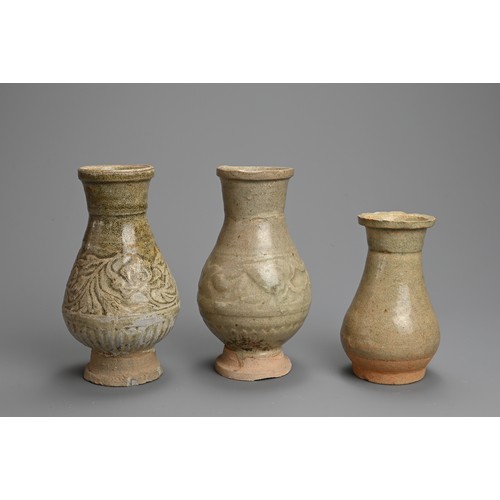 169 - THREE CHINESE QINGBAI WARE VASES, SOUTHERN SONG DYNASTY. The two larger vases with decorated with pe... 