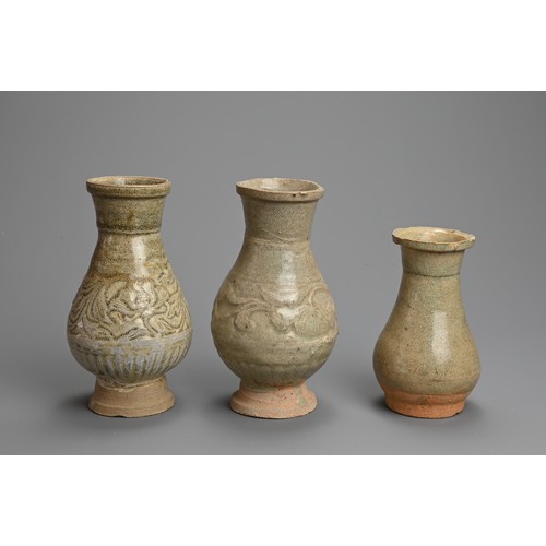 169 - THREE CHINESE QINGBAI WARE VASES, SOUTHERN SONG DYNASTY. The two larger vases with decorated with pe... 