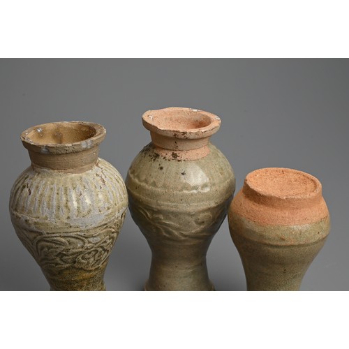 169 - THREE CHINESE QINGBAI WARE VASES, SOUTHERN SONG DYNASTY. The two larger vases with decorated with pe... 