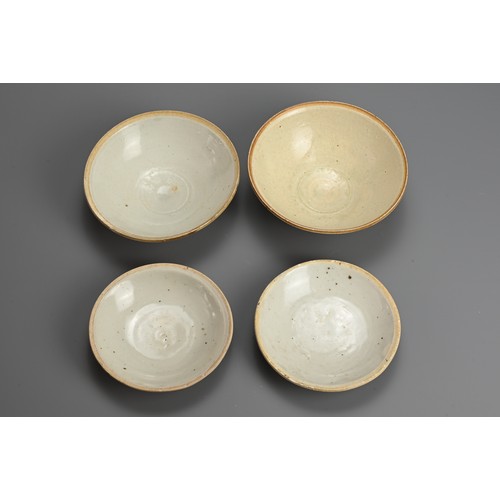 170 - A GROUP OF CHINESE QINGBAI WARE BOWLS AND DISHES, SOUTHERN SONG DYNASTY. Two bowls and two dishes co... 