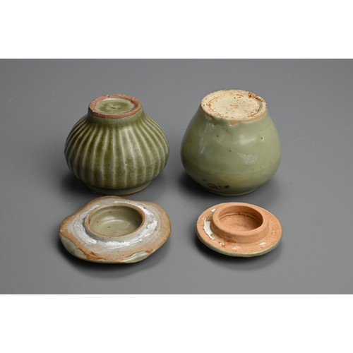 176 - TWO CHINESE LONGQUAN CELADON GLAZED PORCELAIN JARS AND COVERS, MING DYNASTY. Each of compressed balu... 