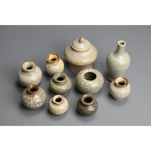 179 - A GROUP OF CHINESE CRACKLE WARE PORCELAIN ITEMS, QING DYNASTY. To include seven globular jars; A bru... 